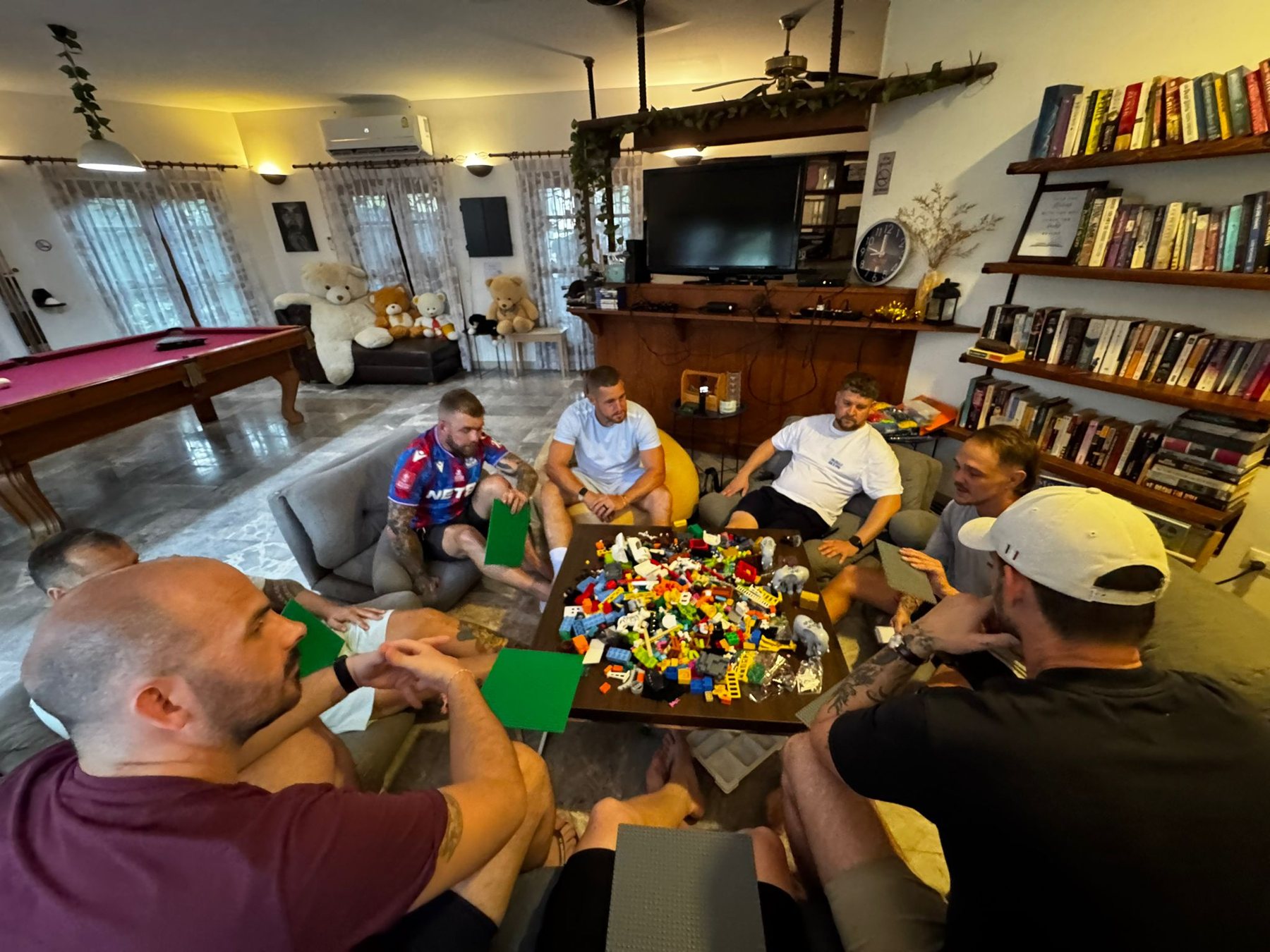 Veterans gathered around a table during a Lego Serious Play reflection session